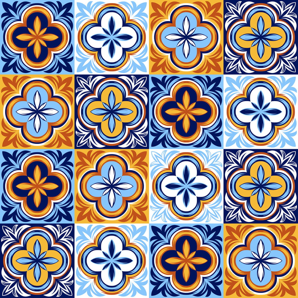 Bunte italienische Mosaikfliesen in einem floralen Muster, bestehend aus Blau-, Gelb- und Weißtönen.